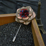 Wooden lapel pin with blue red flower