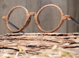 Wood glasses with circular brown frame and black arms